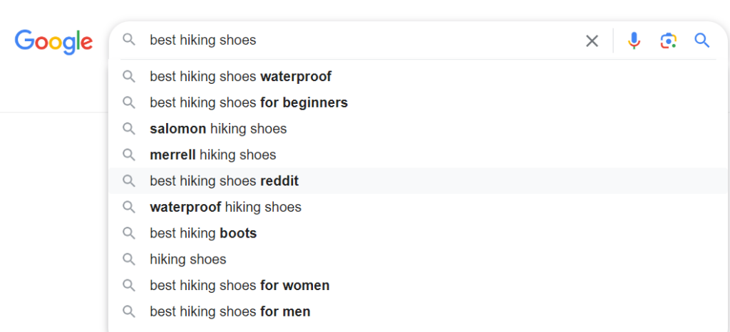 enter your seed phrases like your product category, the primary purpose of your product, or the service you offer into google’s search bar and add a commercial intent modifier example 1
