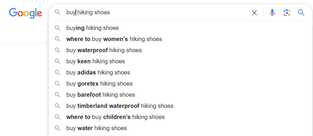 enter your seed phrases like your product category, the primary purpose of your product, or the service you offer into google’s search bar and add a commercial intent modifier example 2